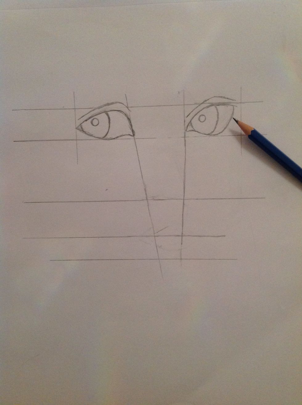 Now draw draw small circle inside each eye, also draw the eyelid.