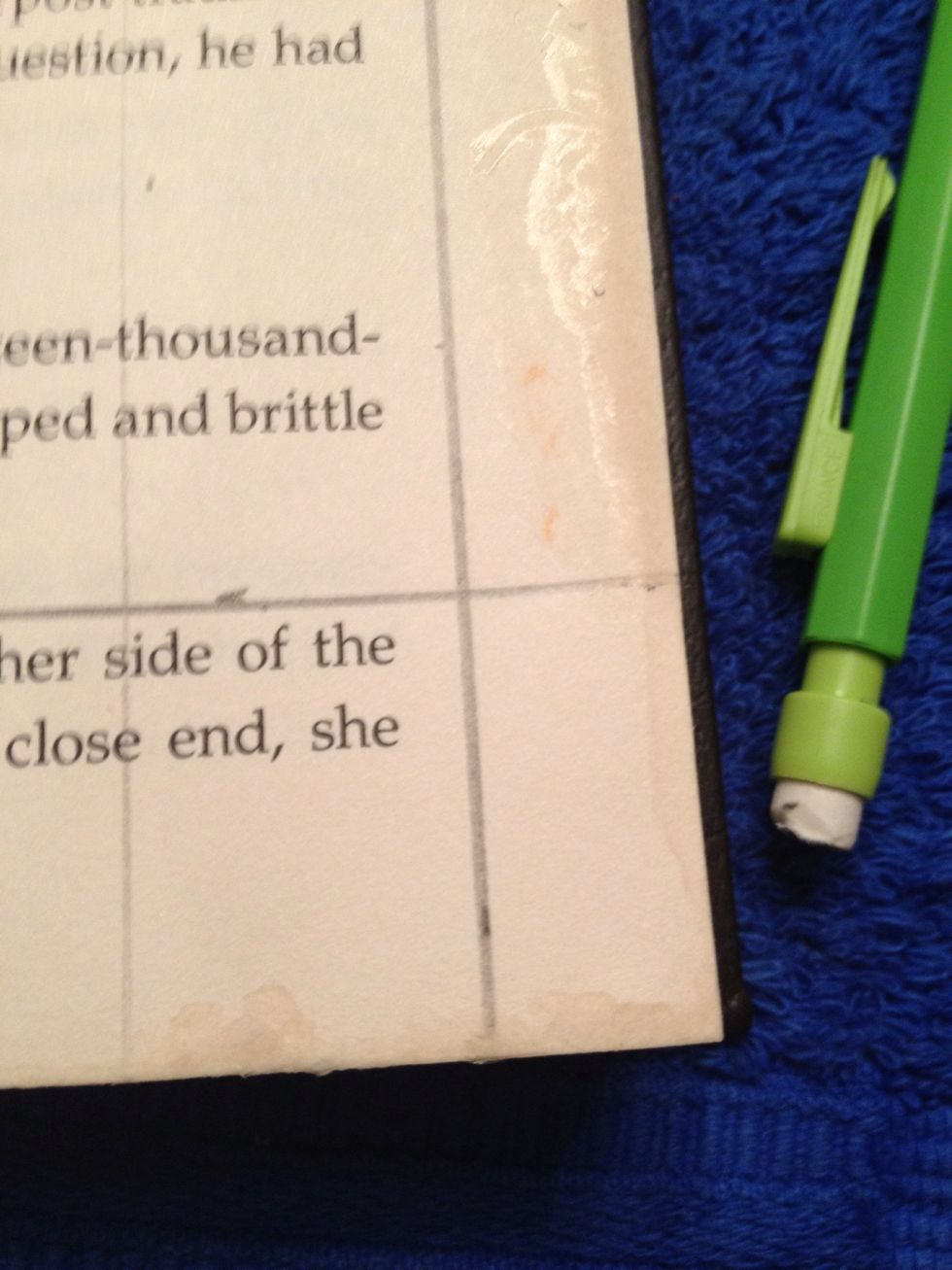 Now draw lines on the first page where you want the secret hole to be. Mine is about 1/2 inch away from the edge and 1 inch from the top and bottom.