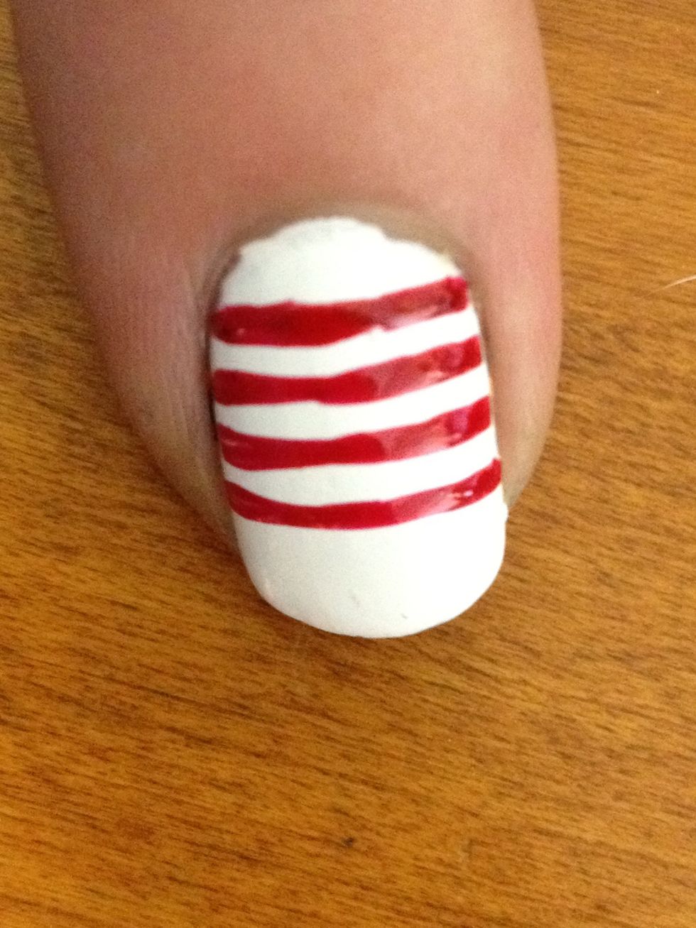 Now draw red lines across the rest of your white nails:)