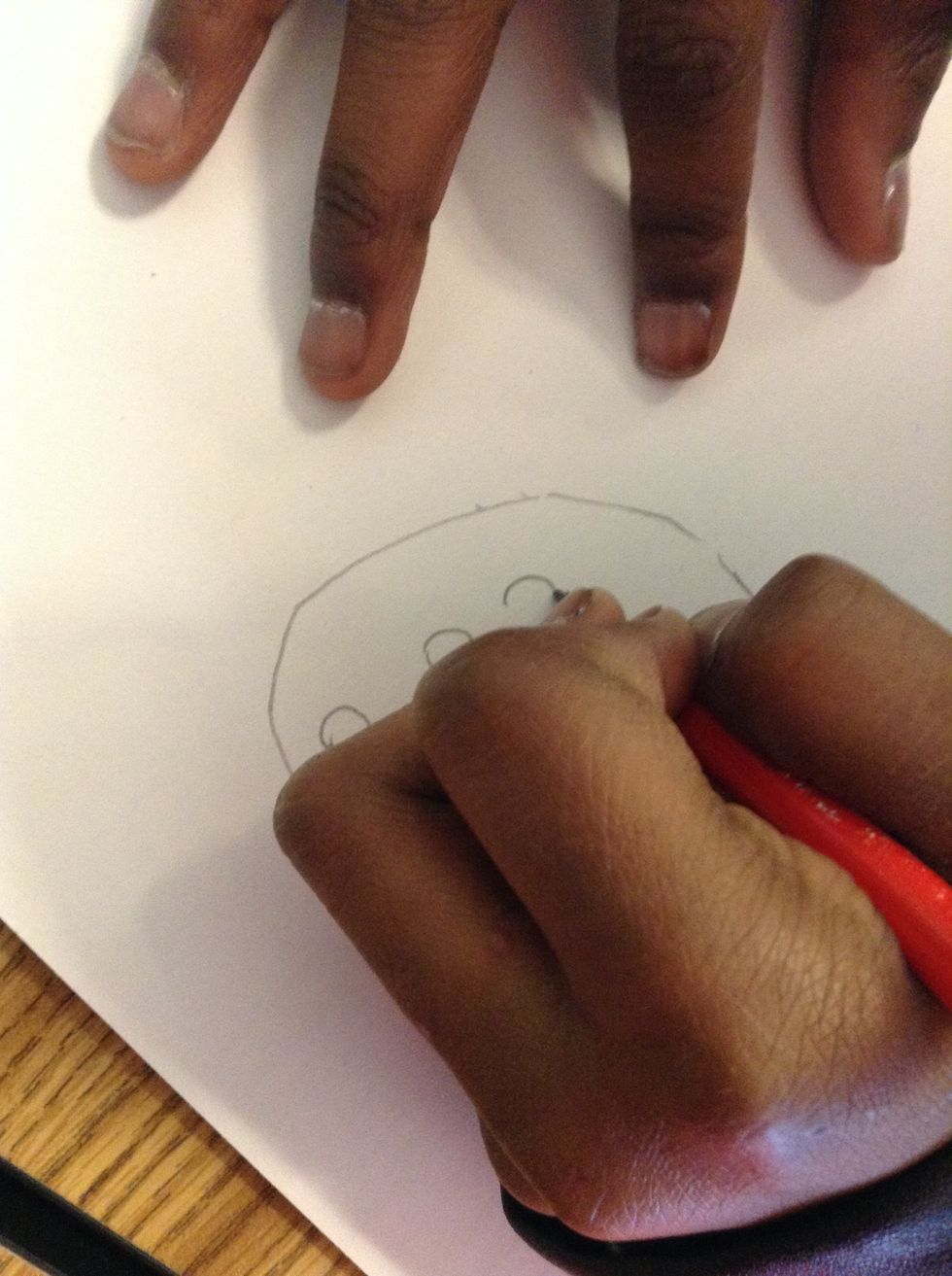 Now,draw some tiny circles inside the big one.