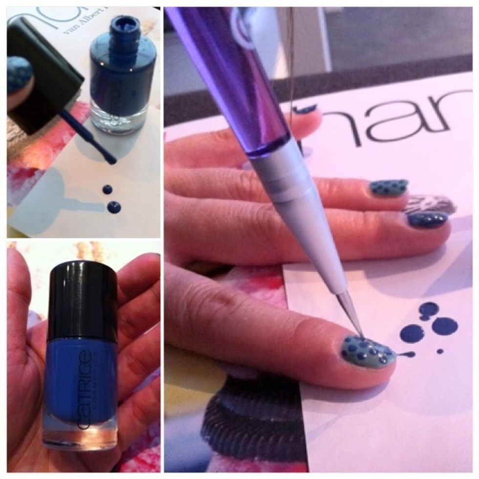 Now drop a blob of the blue colour on a piece of paper. Use dotter to dip into it and make dots on the green nails.