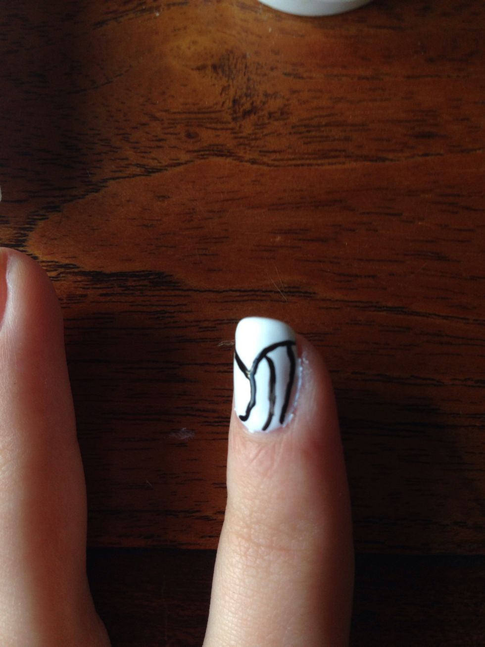 Now fill in all the spaces with two black lines