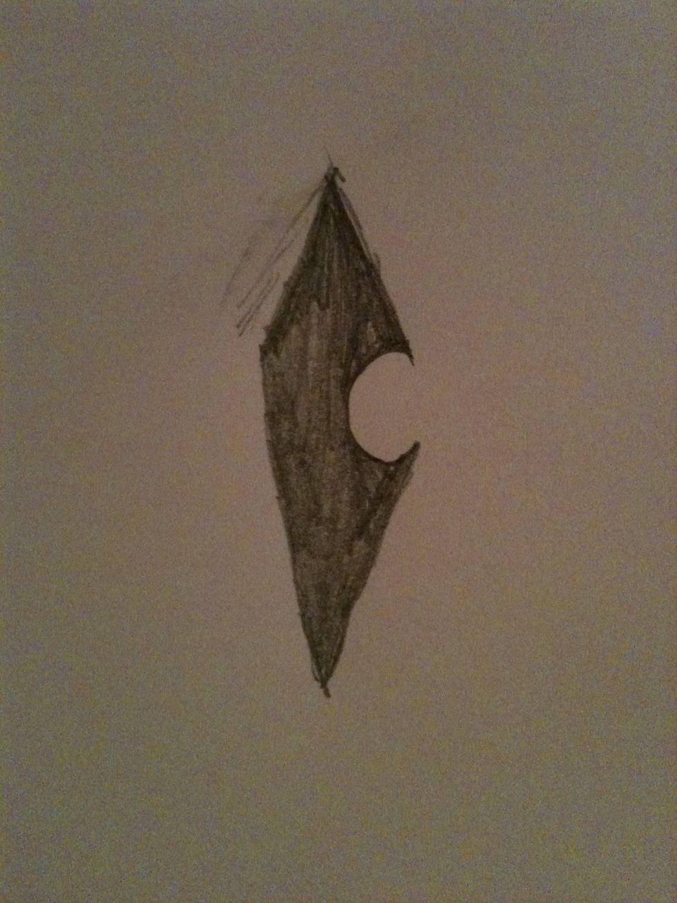 Now fill in the diamond shape darken and shade