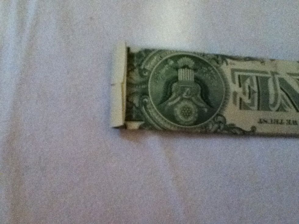 Now flip it over and fold about a quarter inch of the top down