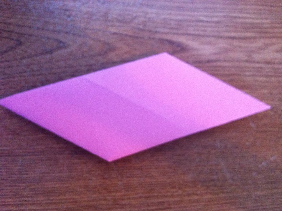 Now flip it over. (THE SIDE WITH THE FOLDS SHOULD BE FACE DOWN )