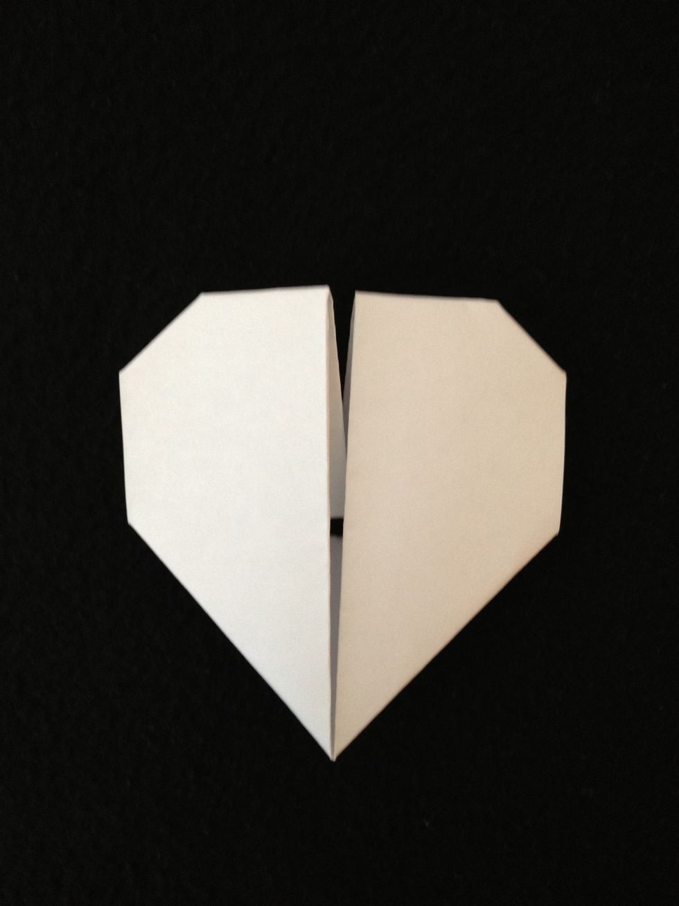Now flip over the heart and fold in the two outside corners.