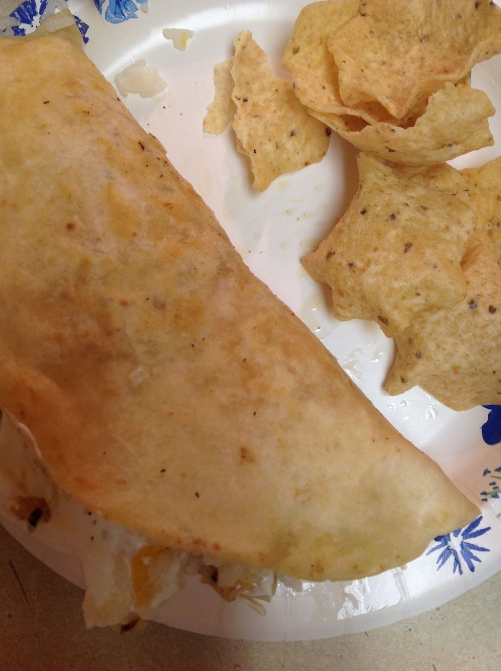Now fold and enjoy, and add chips! (if you want to add additional things like sour cream make sure you take your quesadilla out of the pan first)! Check out my other guides too! :)