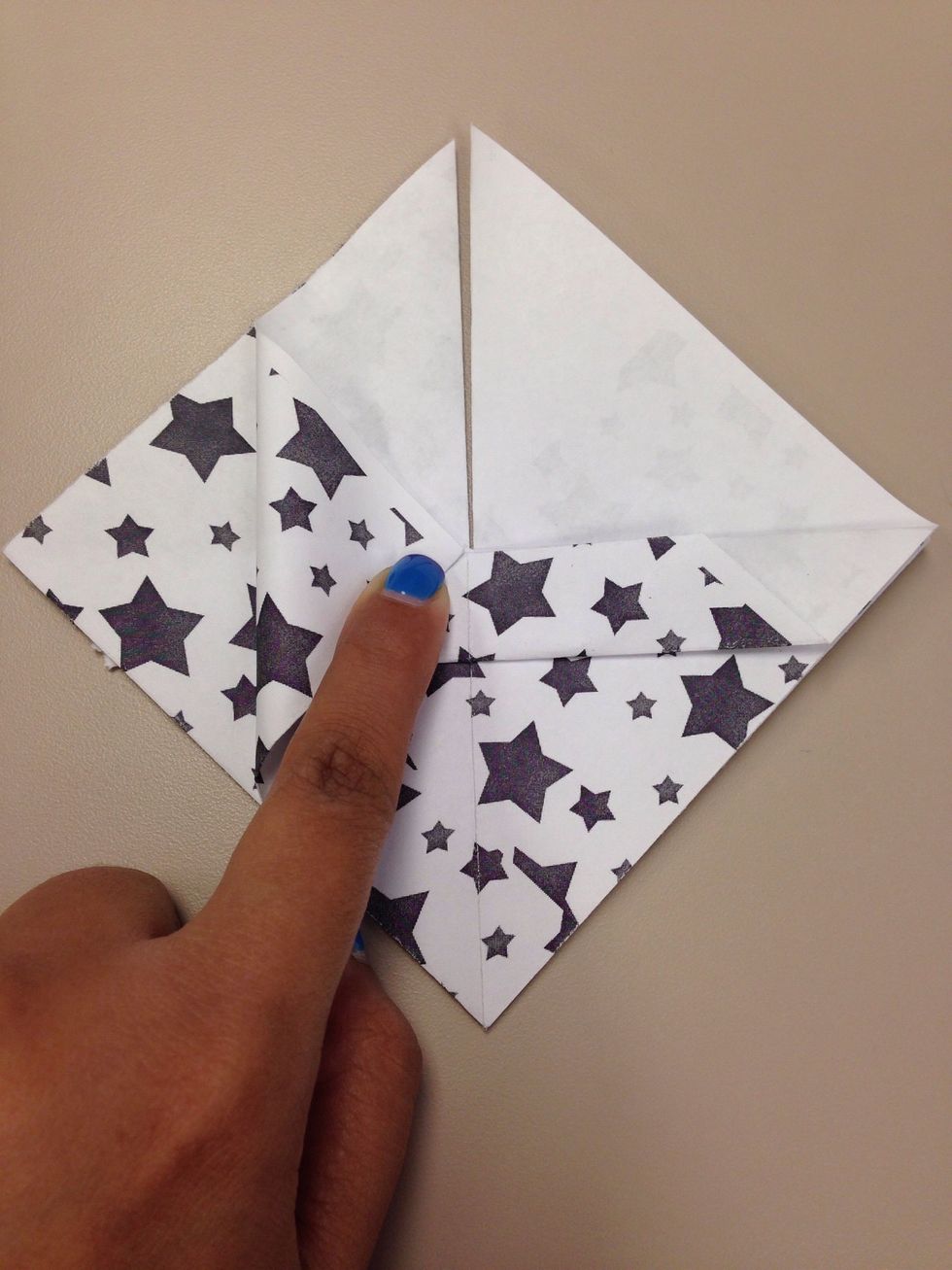 Now fold as shown, make a crease and open it