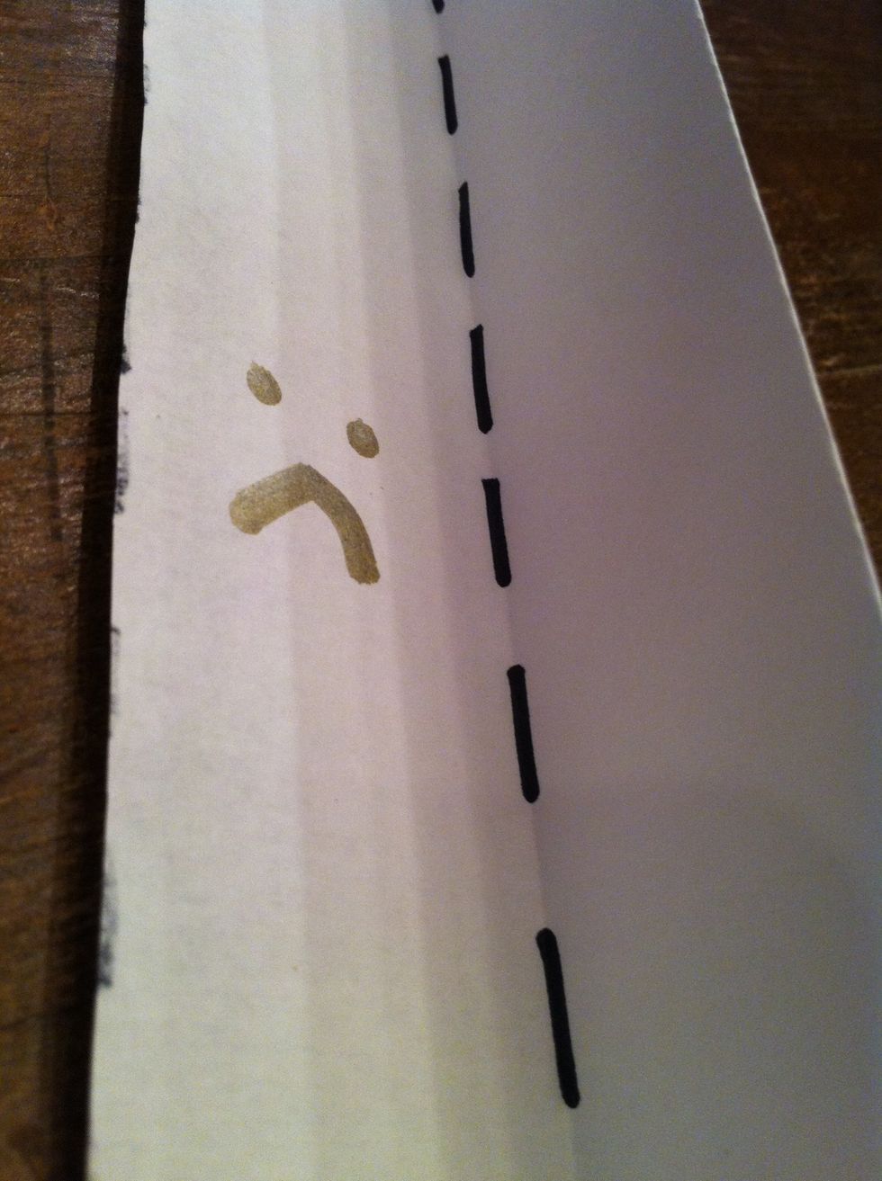 Now fold both of them again vertically!