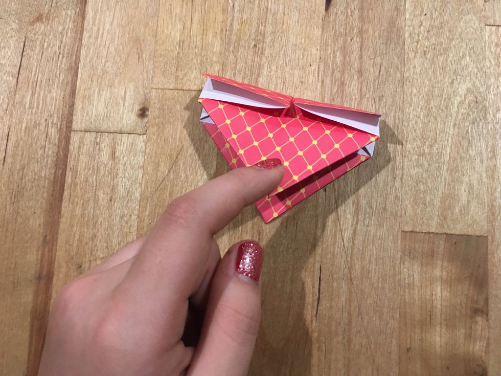 Now fold it in half but DO NOT PRESS DOWN