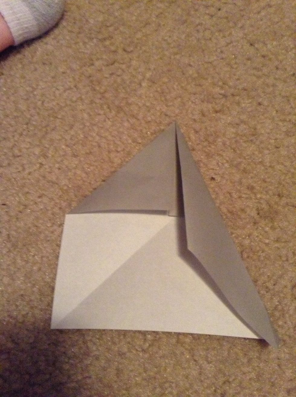 Now fold one edge to the middle