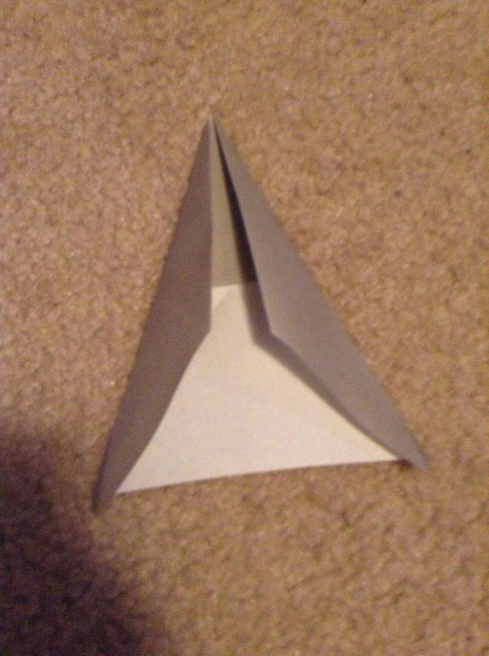 Now fold the other corner to the middle