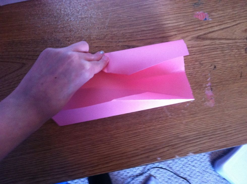 Now fold the quarter marks toward the center.