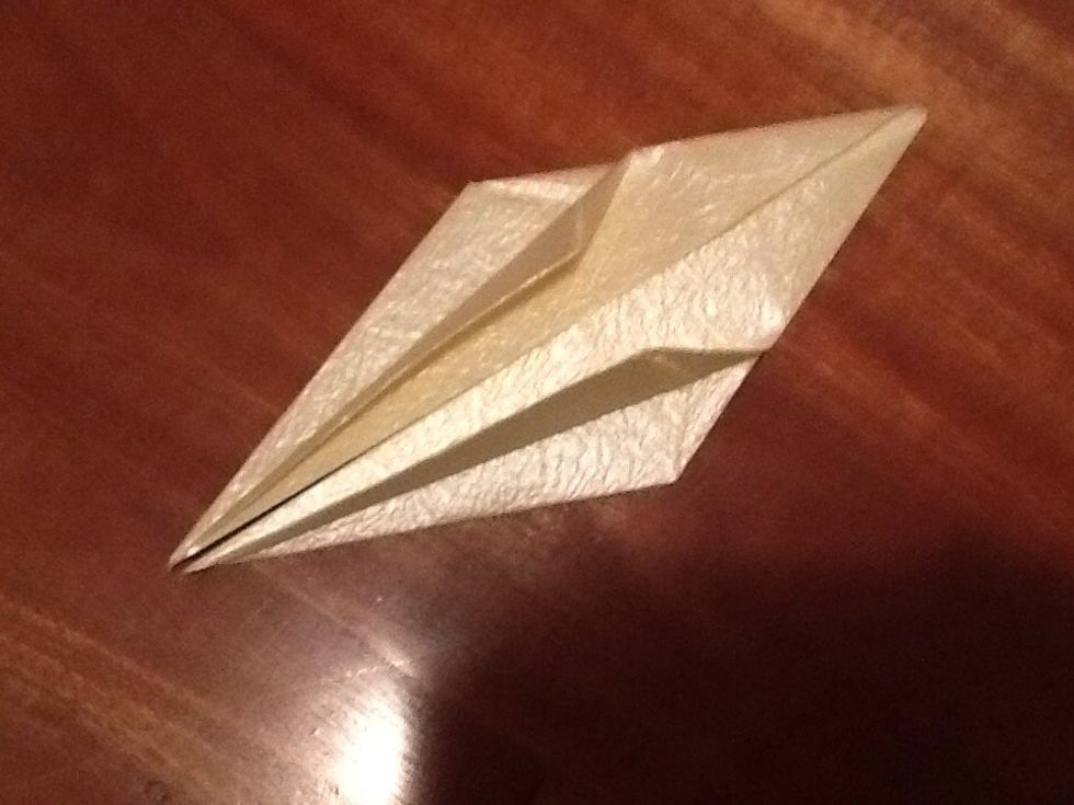 Now fold the sides into the middle