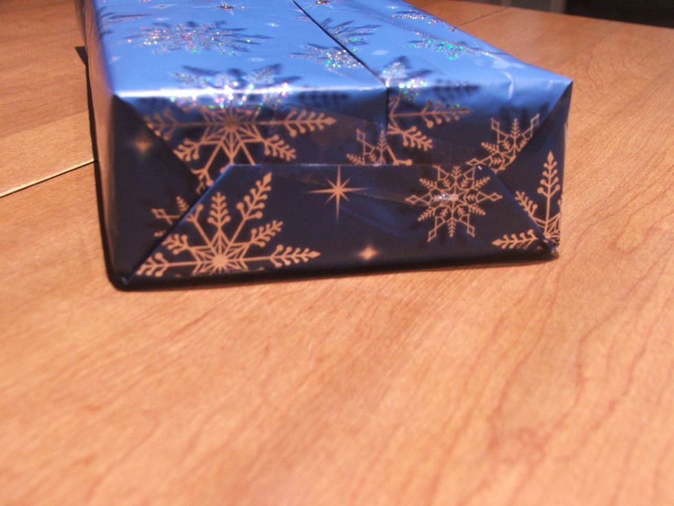 Now fold the top down and the bottom up.