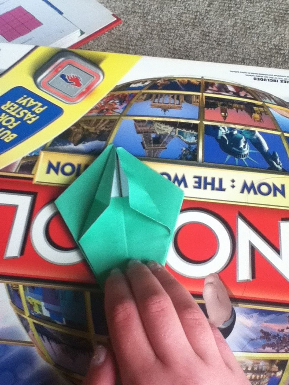 Now fold the top layer into the middle