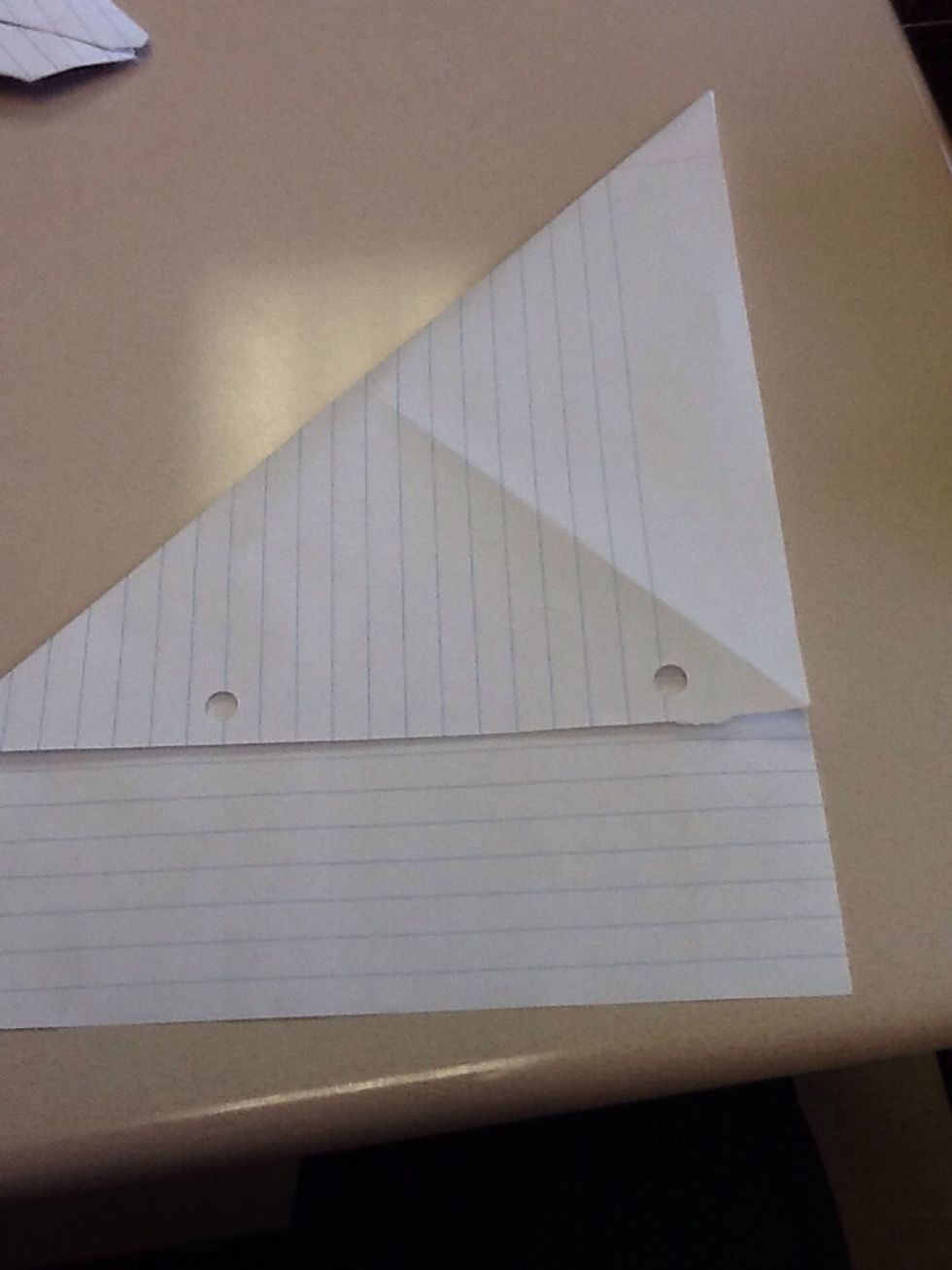 Now fold the top left corner down to the right side then unfold.
