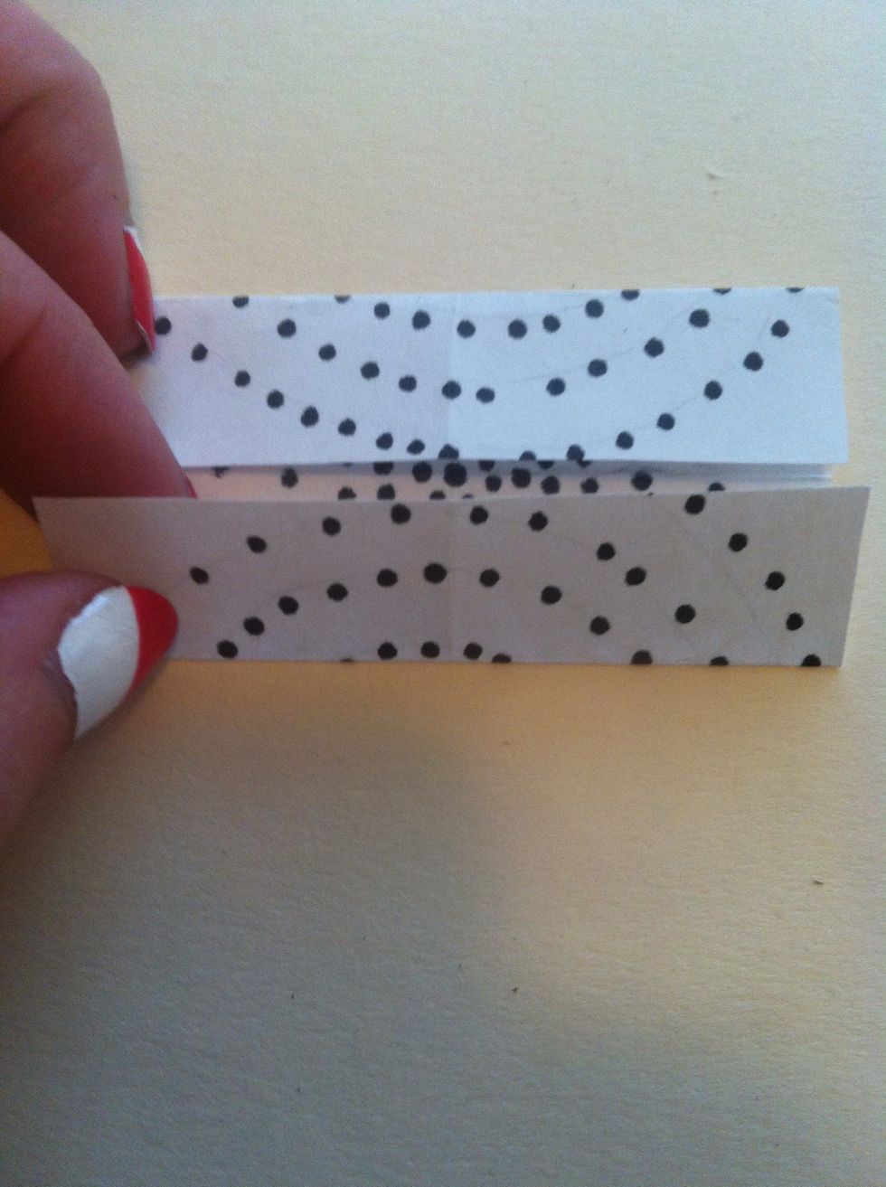 Now fold top edge down to meet center crease.
