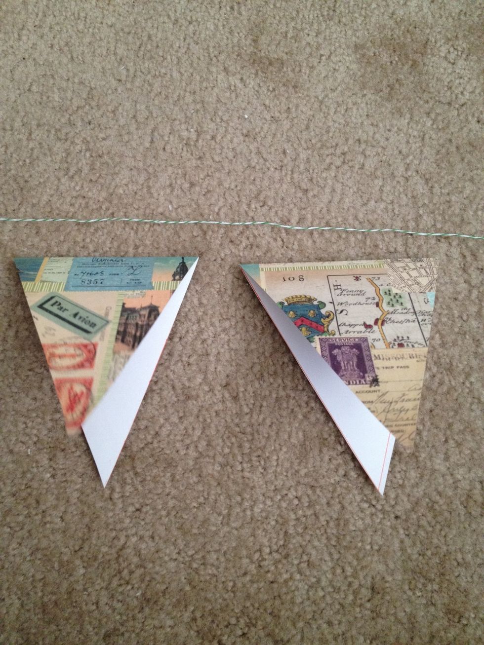 Now fold your scrapbook triangles and grab your glue and string or whatever you prefer to use.