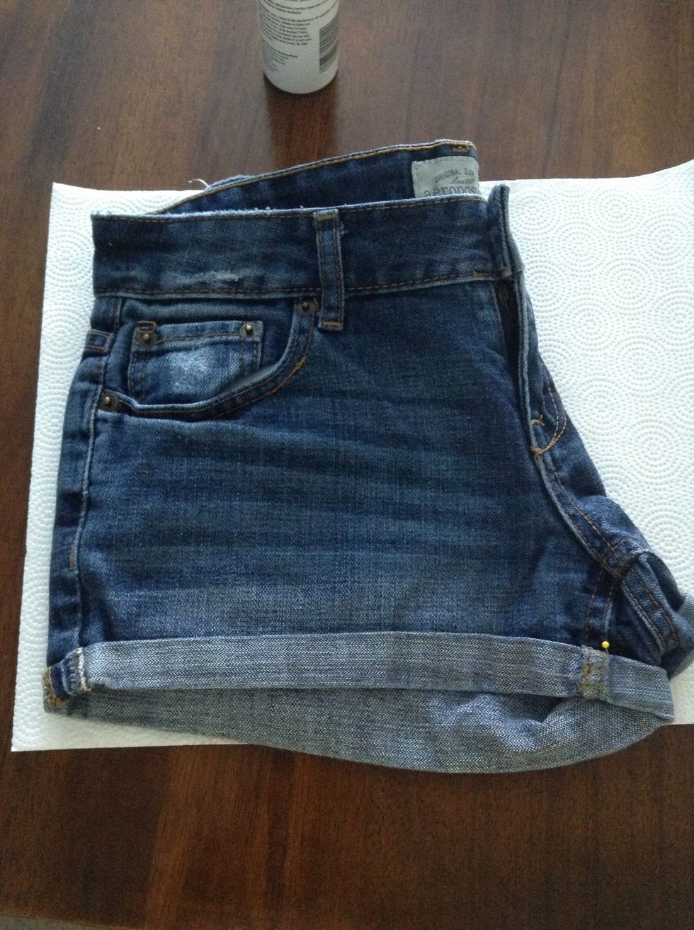 now fold your shorts in half, lace side up