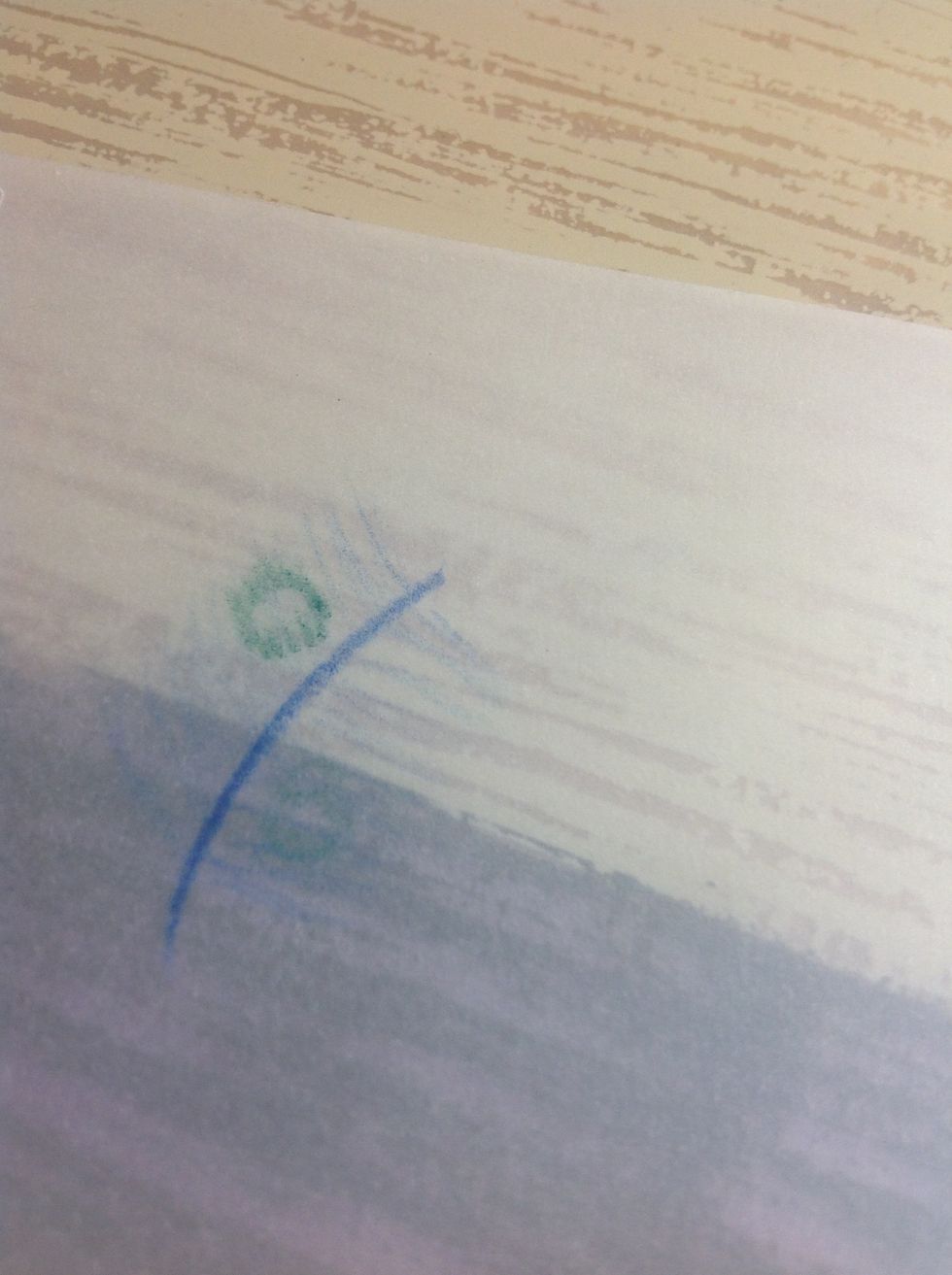 Now, following the blue strokes, stroke the outline of the green. This time you don't have to do it lightly anymore.