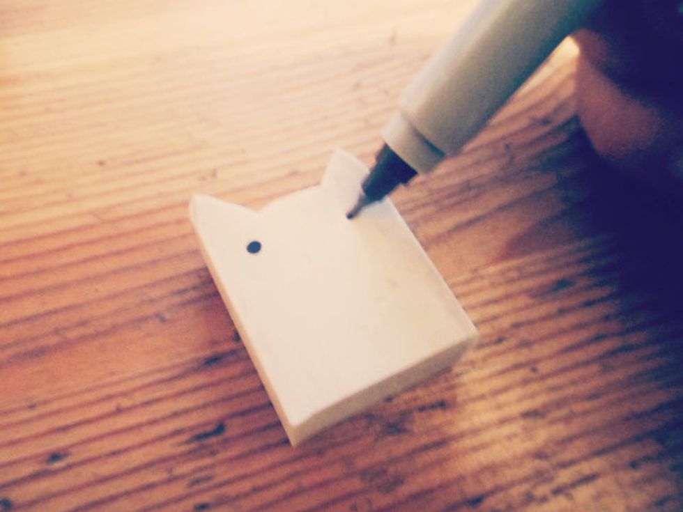 Now for adorable details!!! Draw some eyes and nose totally make the kitty as awesome as you want!