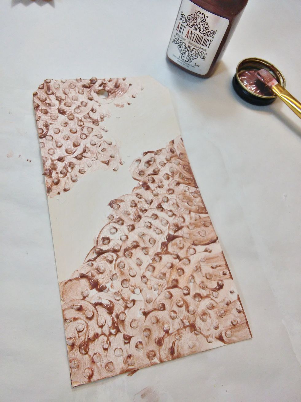 Now for color! I used my Metal Effects Copper Paint and paintbrush to dab paint over my textures areas. Don't let it dry!