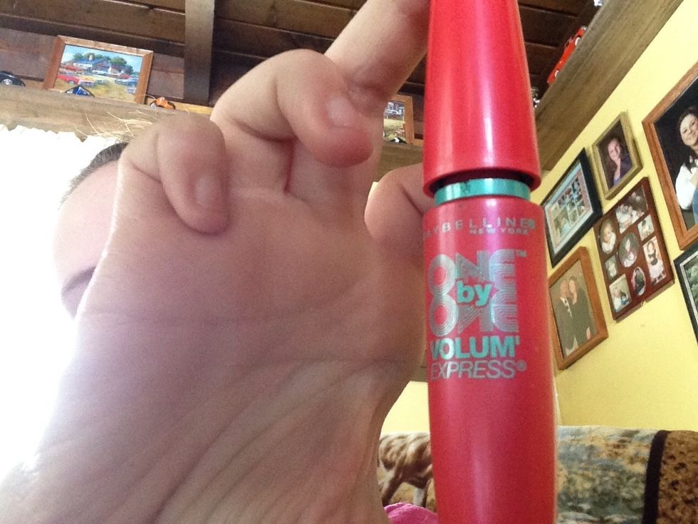 Now for mascara. I am putting two coats on my top lashes