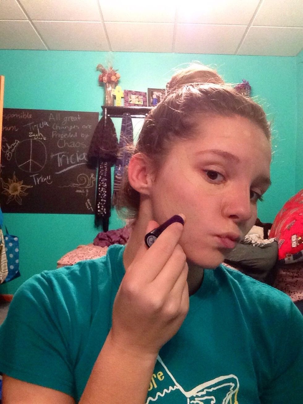 Now for normal concealer, use a shade slightly lighter than your skin tone. Cover all green corrector and under your eyes in a triangle shape. I prefer stick concealer to liquid.