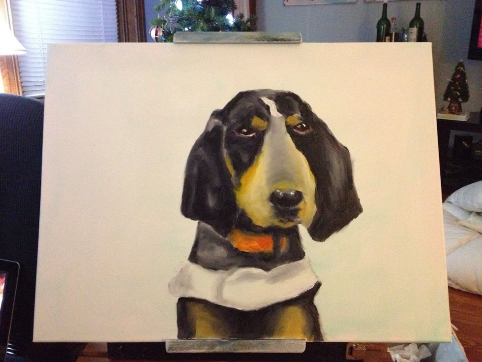 Now for Smokey's soulful stare. Add some white and a dash of red to your pinky and round the eyes with a little pink hue. Switch to black and create his pupils. Finally, a dash of white for reflection