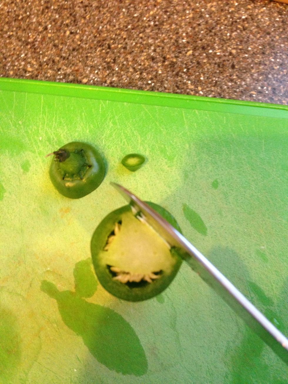 Now for some heat! To finely dice the jalape\u00f1o I cut the stem and tip off then slice to remove the pepper's sides.