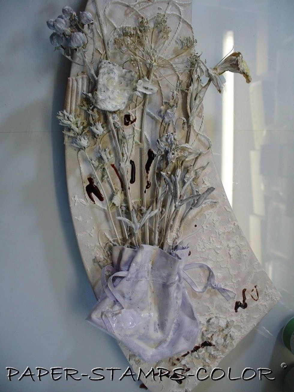 NOW for the coloring... I had to think about that... and started with a safe one... drops of Decadent Minx in the background....