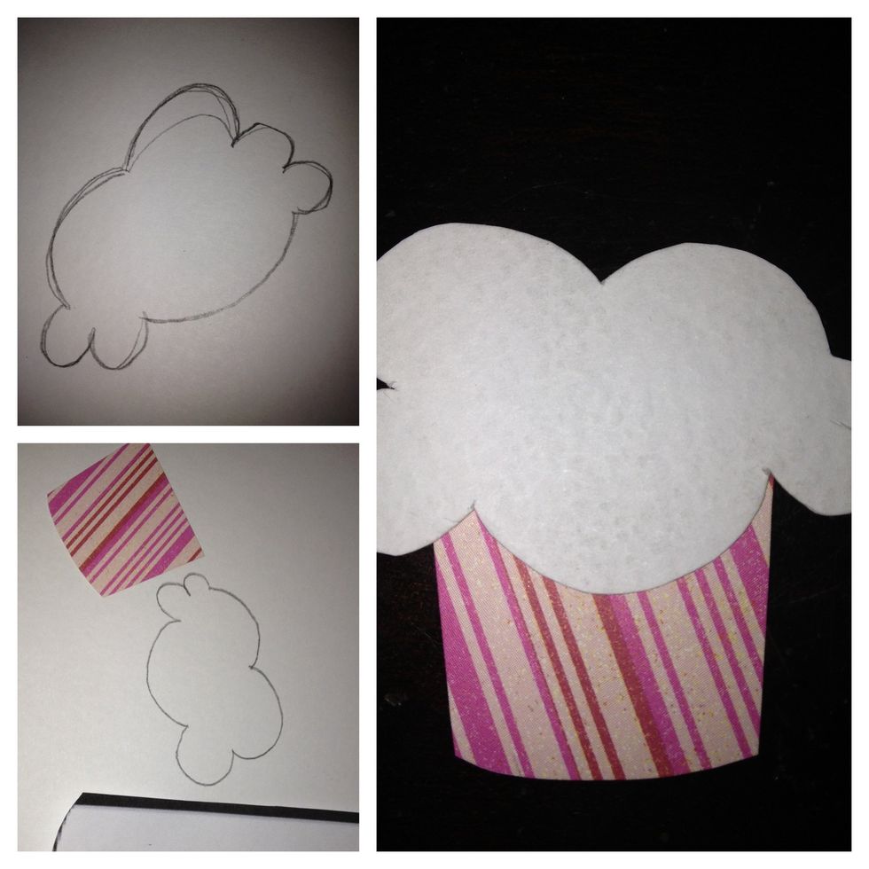 now for the icing: play around with the shape, keep in mind size of the cup and label. cut out your icing from a white paper, and glue to the cup.