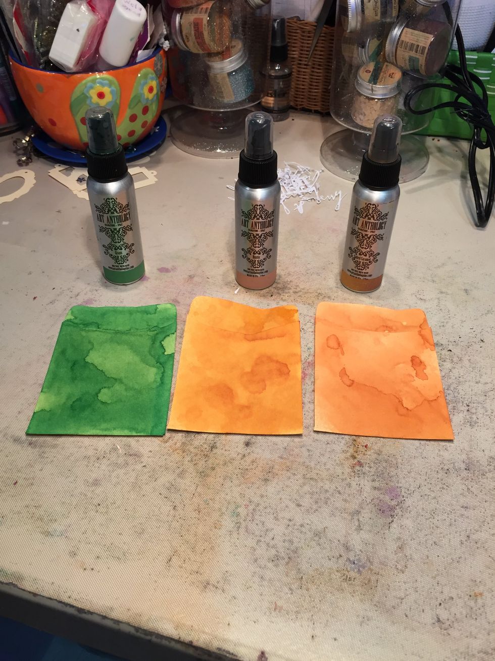 Now for the library pockets the tags go in.  I sprayed one of each with Granny Smith, Rustic, and Timeless.