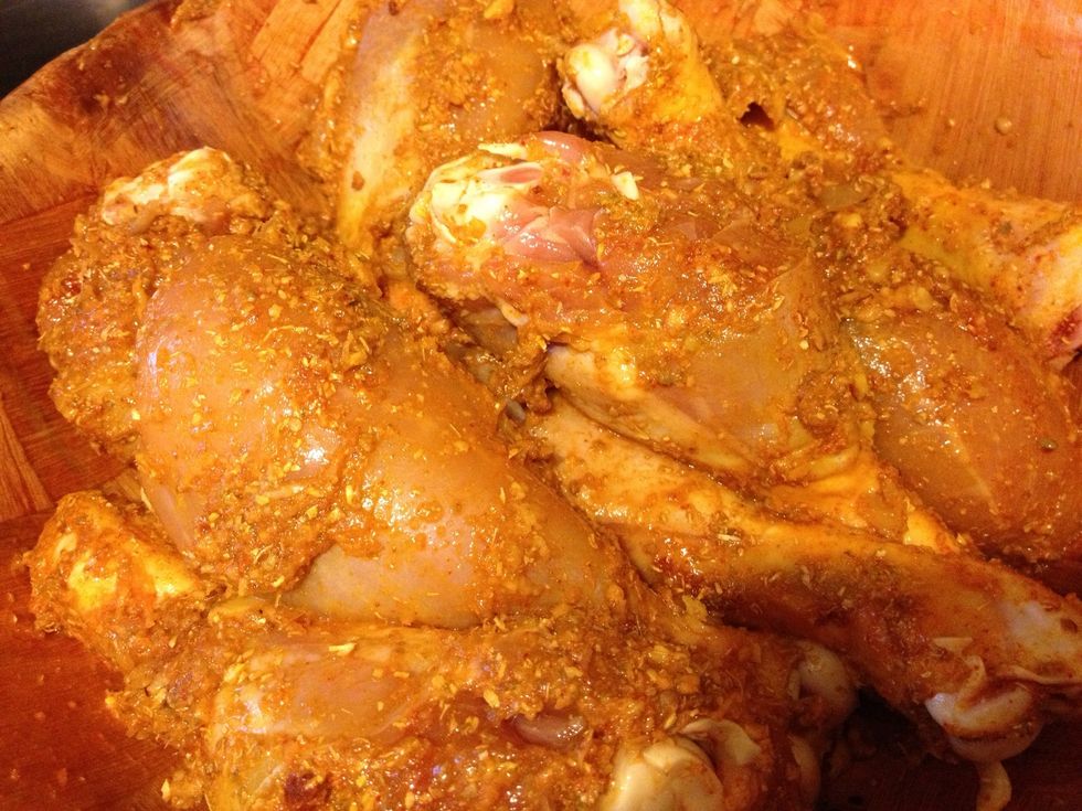 Now for the messy part mix all the ingredients together with your hands.  Then put away in the fridge for 6-8 hours.  The flavors will marinate through the chicken very well