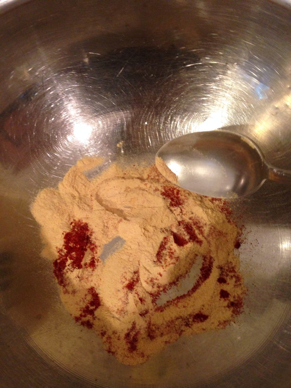 Now for the next step : egg wash. This gets a healthy dose of seasoning as well. If you want to spice it up a bit, feel free to add chili powder here.