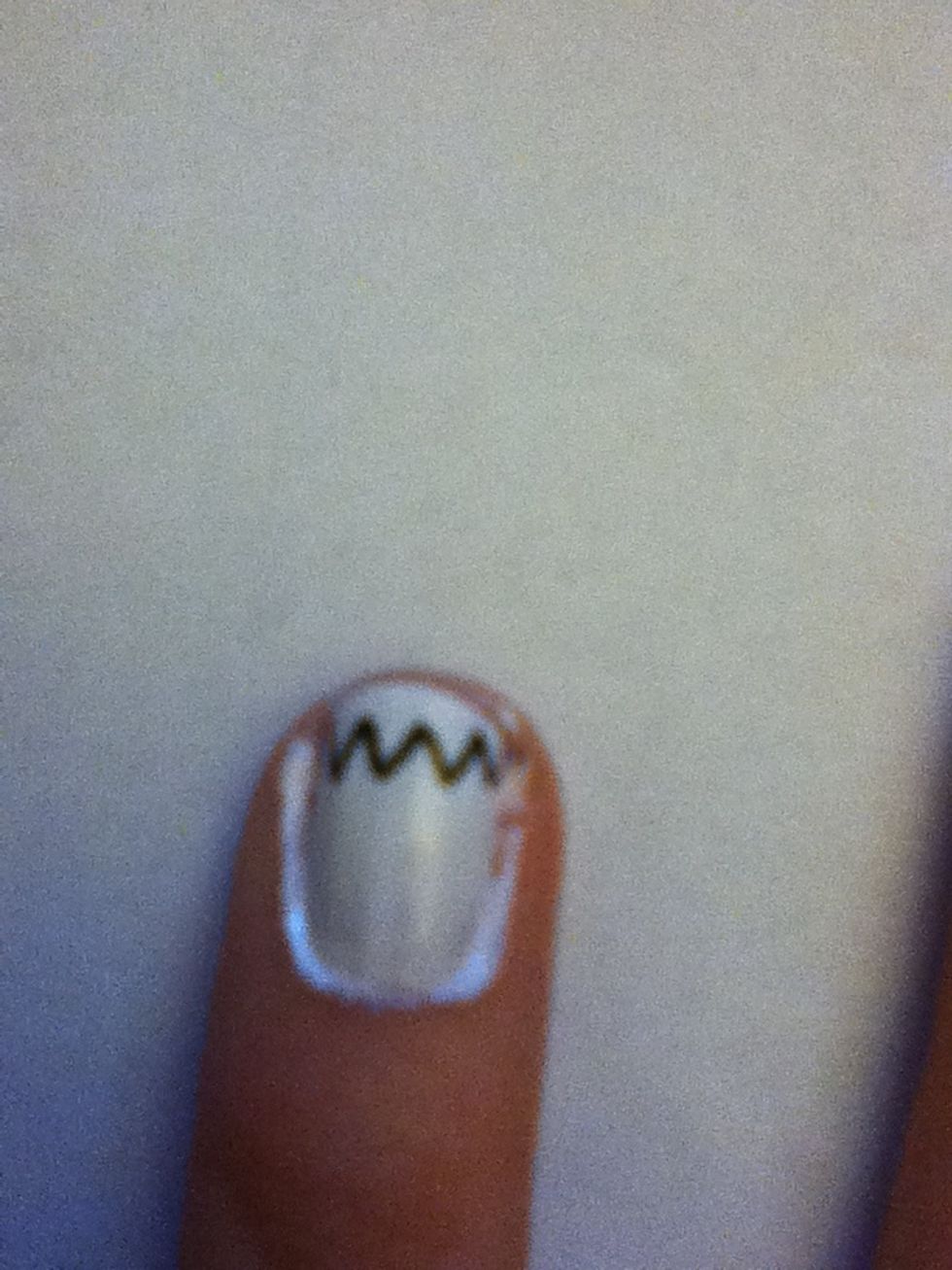 Now for the ring finger. Start by drawing a zigzag toward the top of the nail as shown.