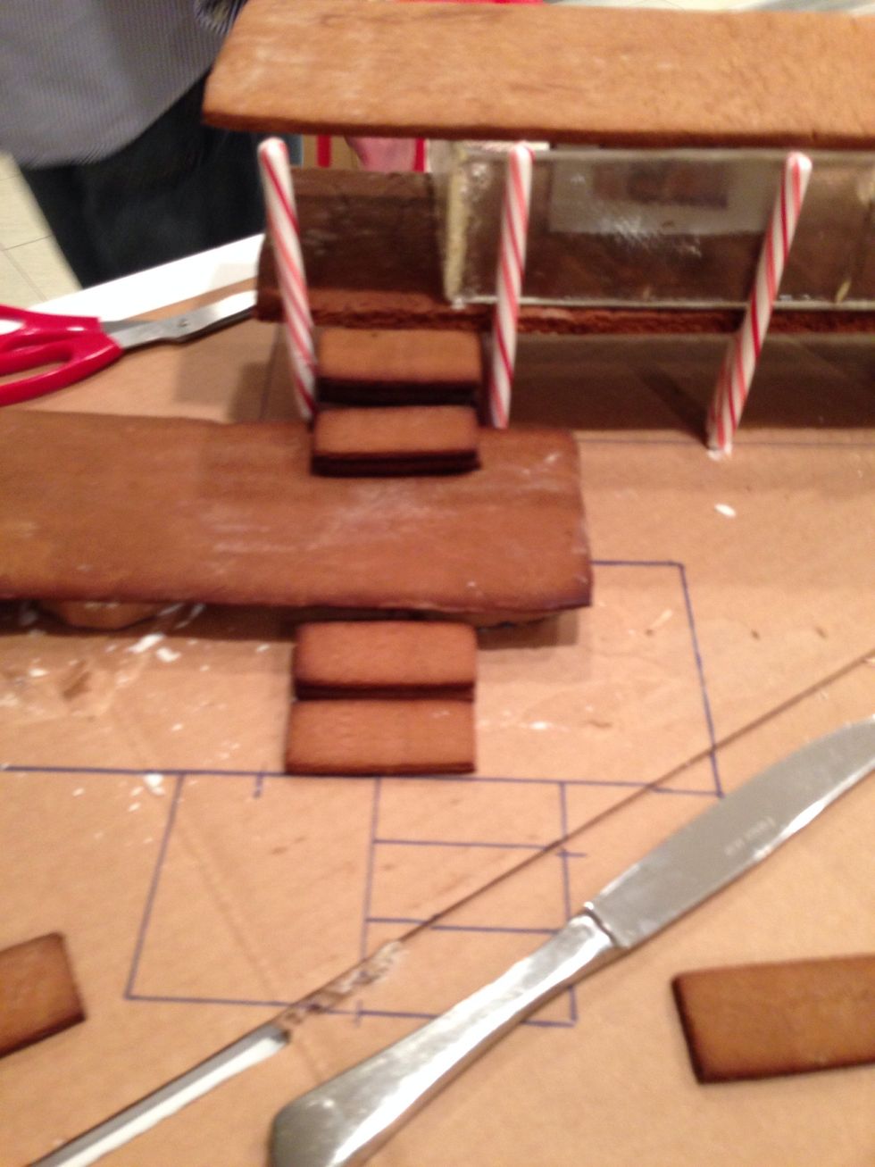 Now, for the steps. I'm not sure why the house isn't sitting on those carefully drawn straight lines. And Throckmorton isn't answering his phone.