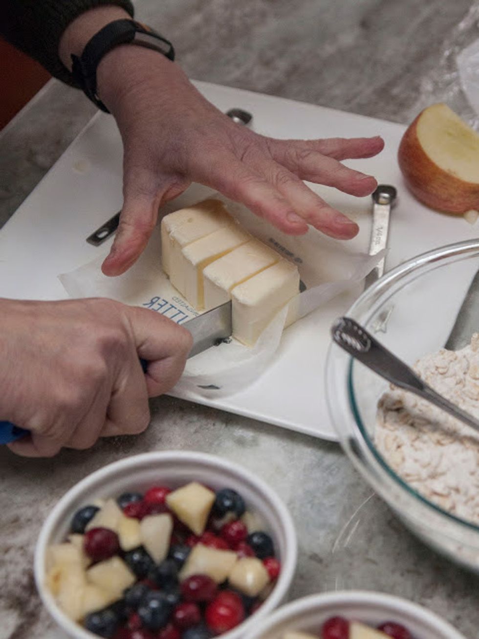 Now for the topping, cut the softened butter into bite sized pieces.