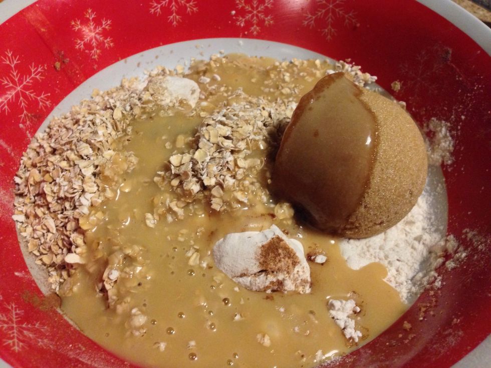Now for the topping. In a new bowl add all the remaining dry ingredients together (see ingredients list for strudel topping). Then pour 1/2 cup of your Baileys Butter Sauce over your dry ingredients.