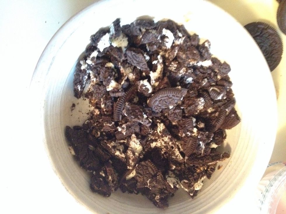 Now for the topping. Smash up six Oreos. Not too much though! Just enough to sill be able to tell that it's Oreos. I threw in a few mini chocolate chips. Again; optional.