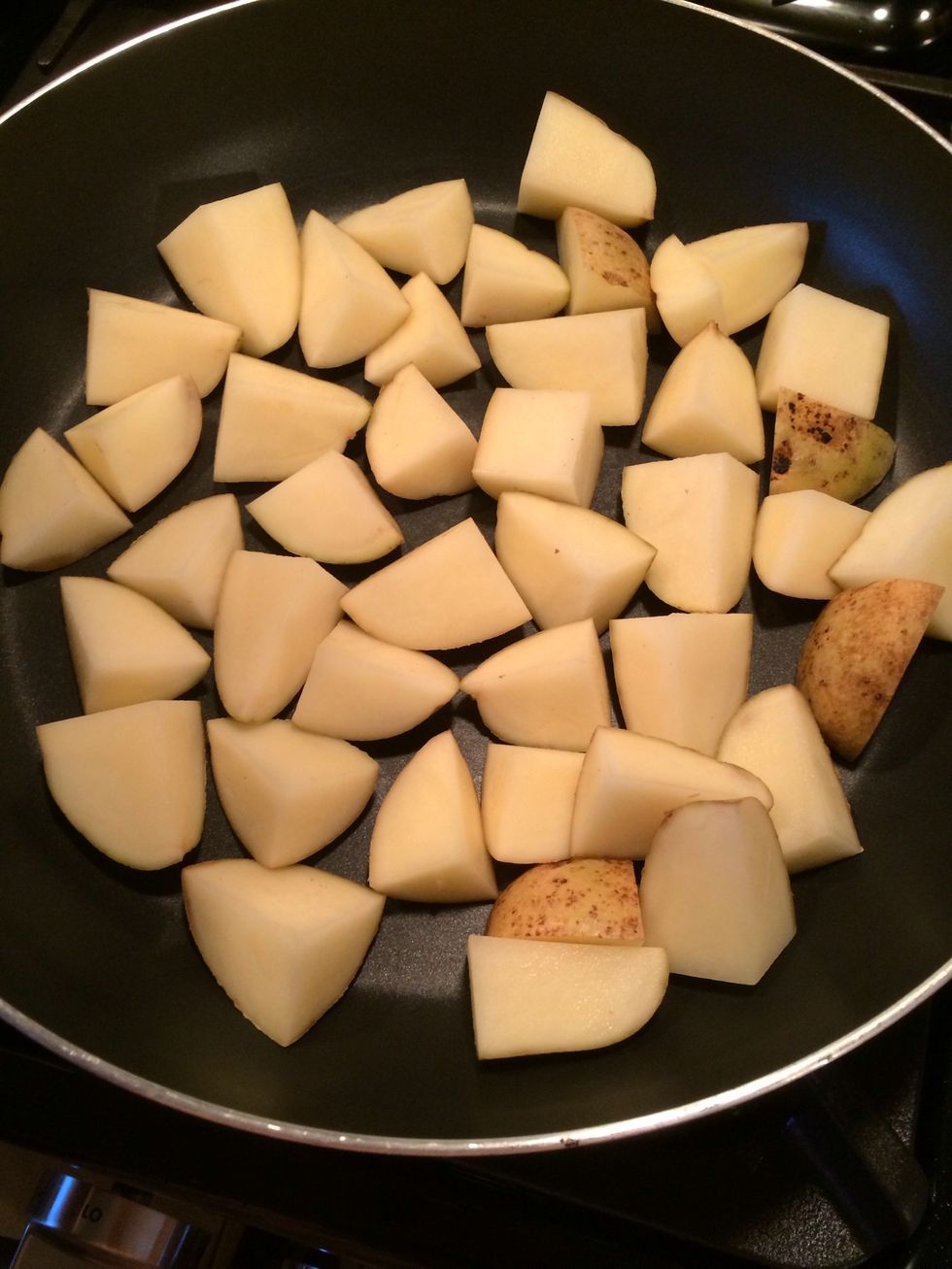 Now for this step you will need a nonstick pan. This will prevent the potatoes from sticking to the pan when we are all done. Arrange  the potatoes in one layer