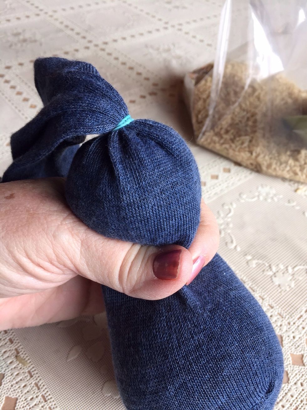 Now, form bunnies head and tie rubber band or twine to 'seal' head.