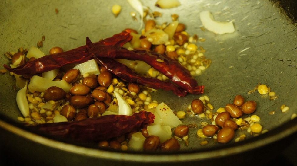 Now garlic and red chillies..