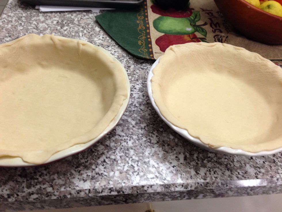 Now gently place the crusts into the pie plates and press them into place. I used pre made crust because this is "quick" quiche after all!