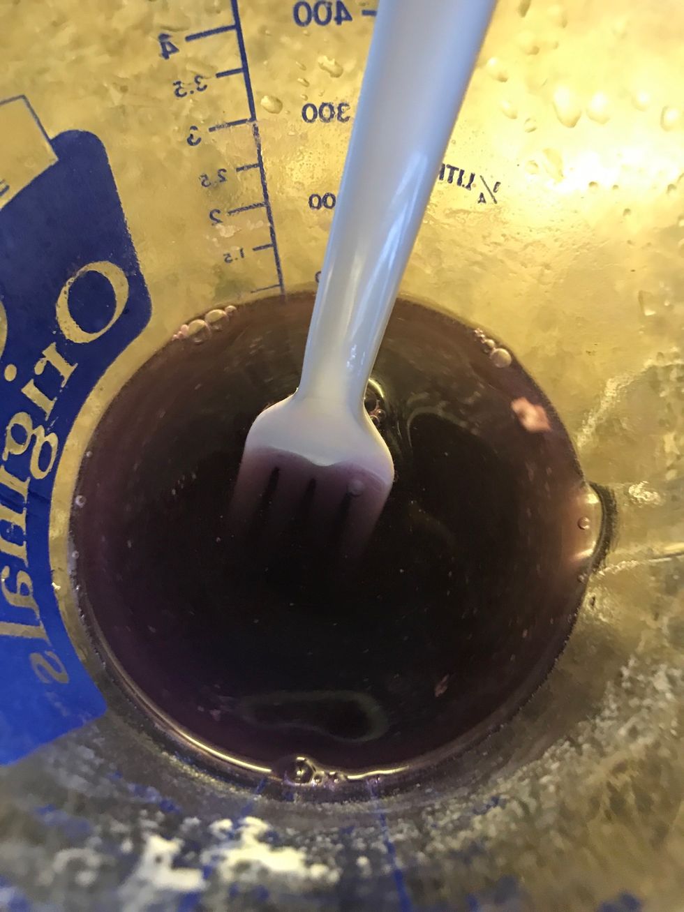 Now get 1/2 cup of water and add your color dye now if you want to.