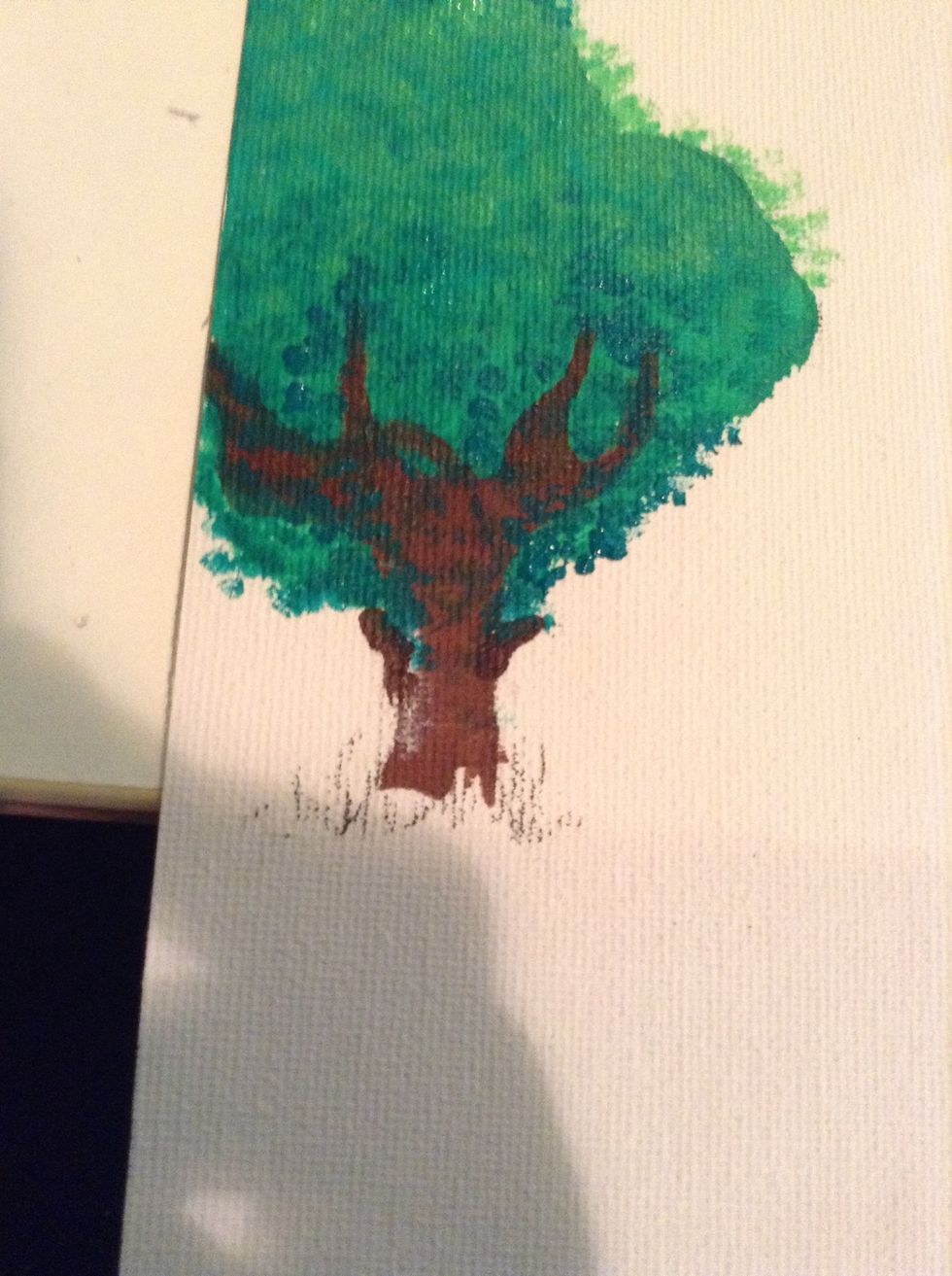 now get a dark shade and cover the bottom and trunk with it. make it fade!!