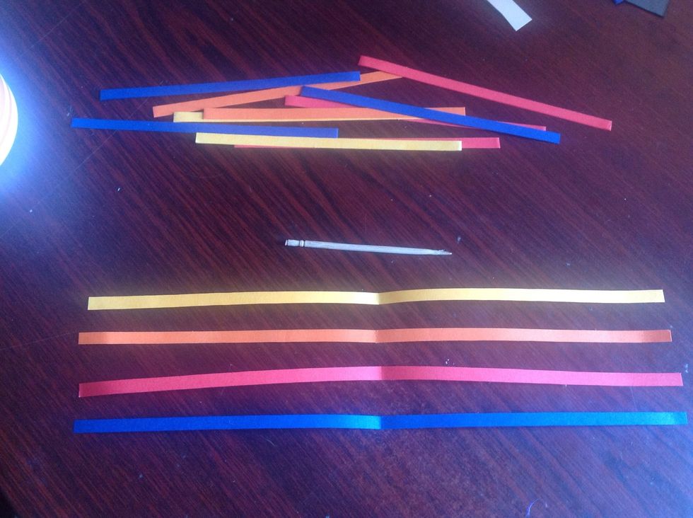 Now! Get different colour strips ... I get blue, red , orange , yellow. Length of one strips 21cm , thick 1/2 cm