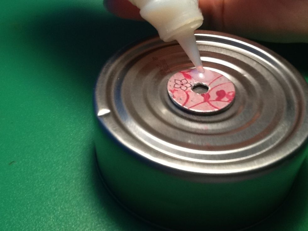 Now get something to put the washer on so it can be easily moved & won't spill. Then apply the "Mod podge Demensional magic"
