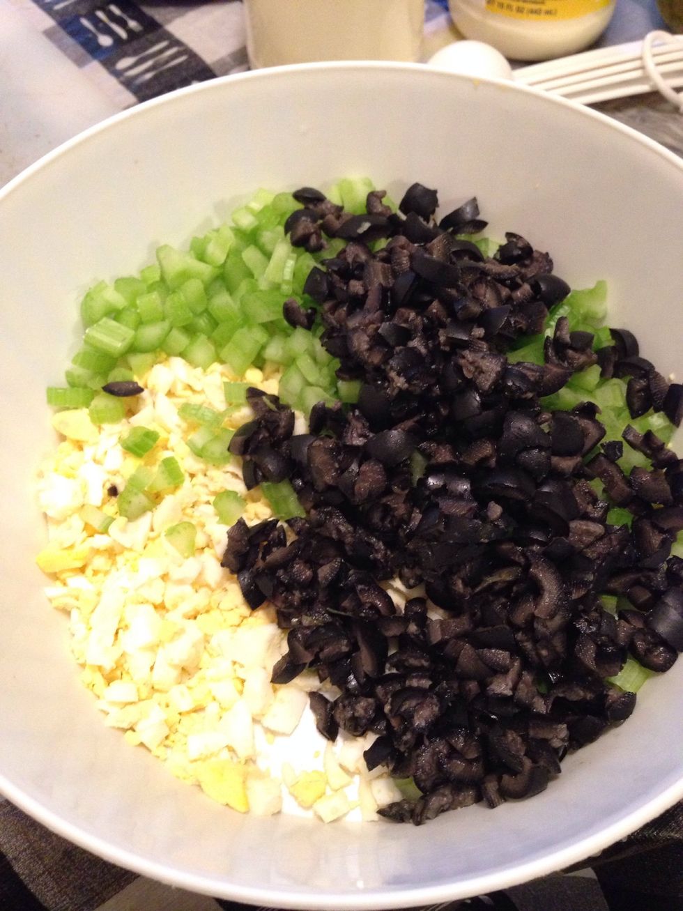 Now get your "Bowl of chopped goods" and pour the ingredients into the bowl of potatoes.